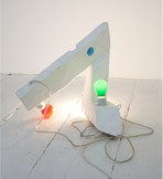 FALLEN MOBILE, 2002, paper mache on styrofoam, colored lights and wire, 16.5 x 19 x 15.5