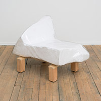 CHUNK CHAIR FASTBACK, 2006-2008, styrofoam, vinyl, plywood and concrete block, 48 x 24 x 31 inches
